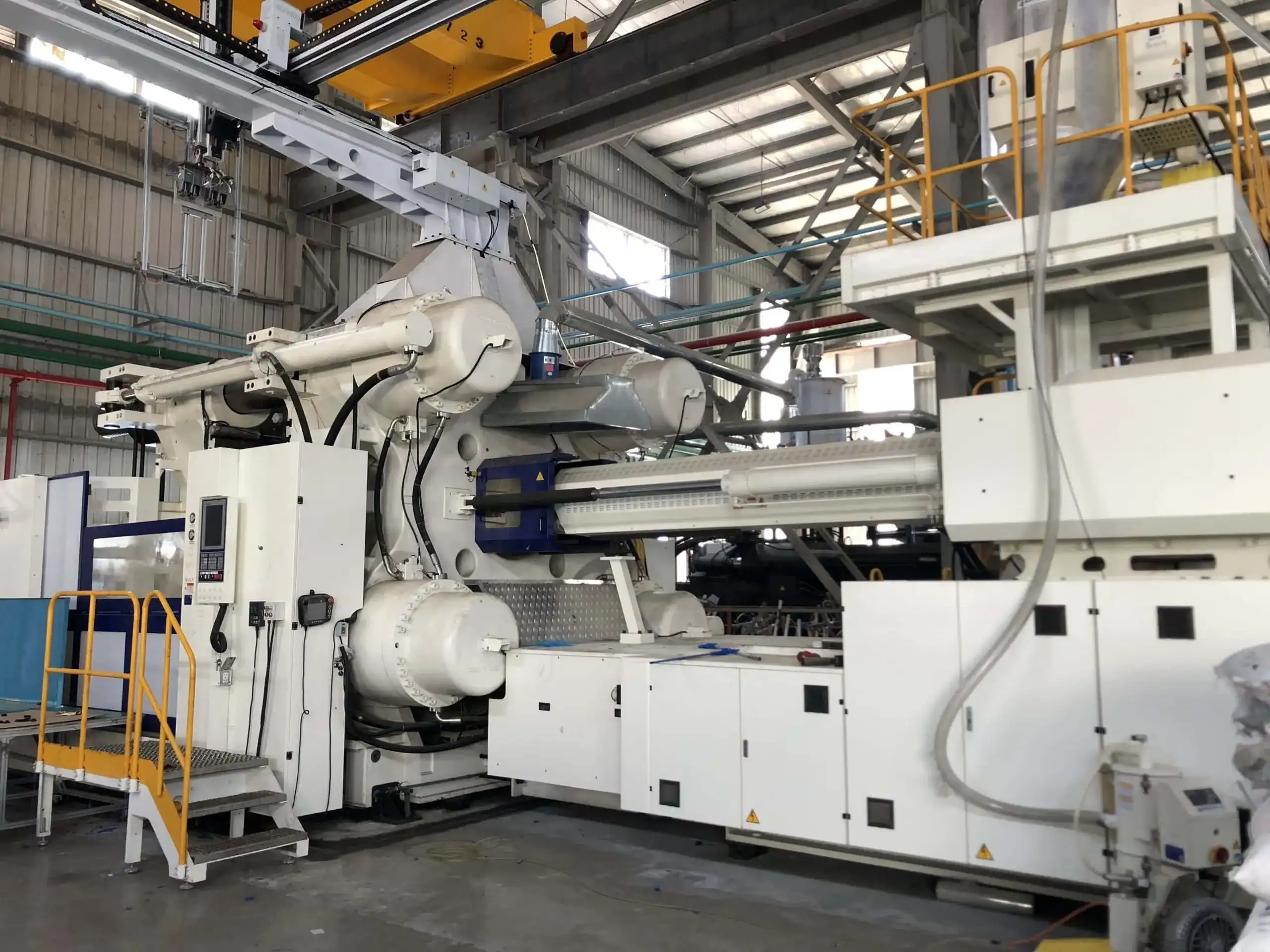 What does an injection molding machine do?