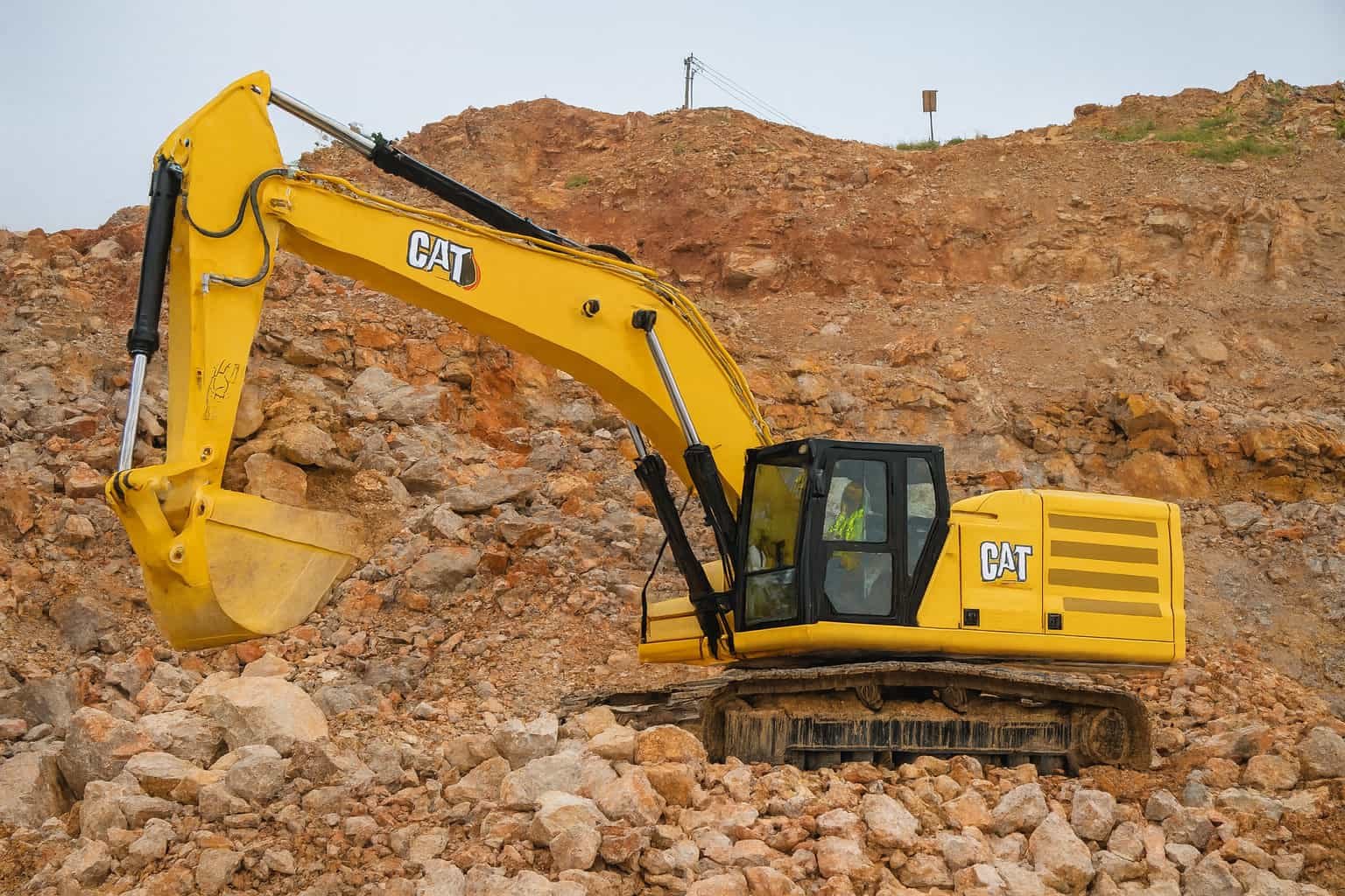 the objective of hydraulic excavator